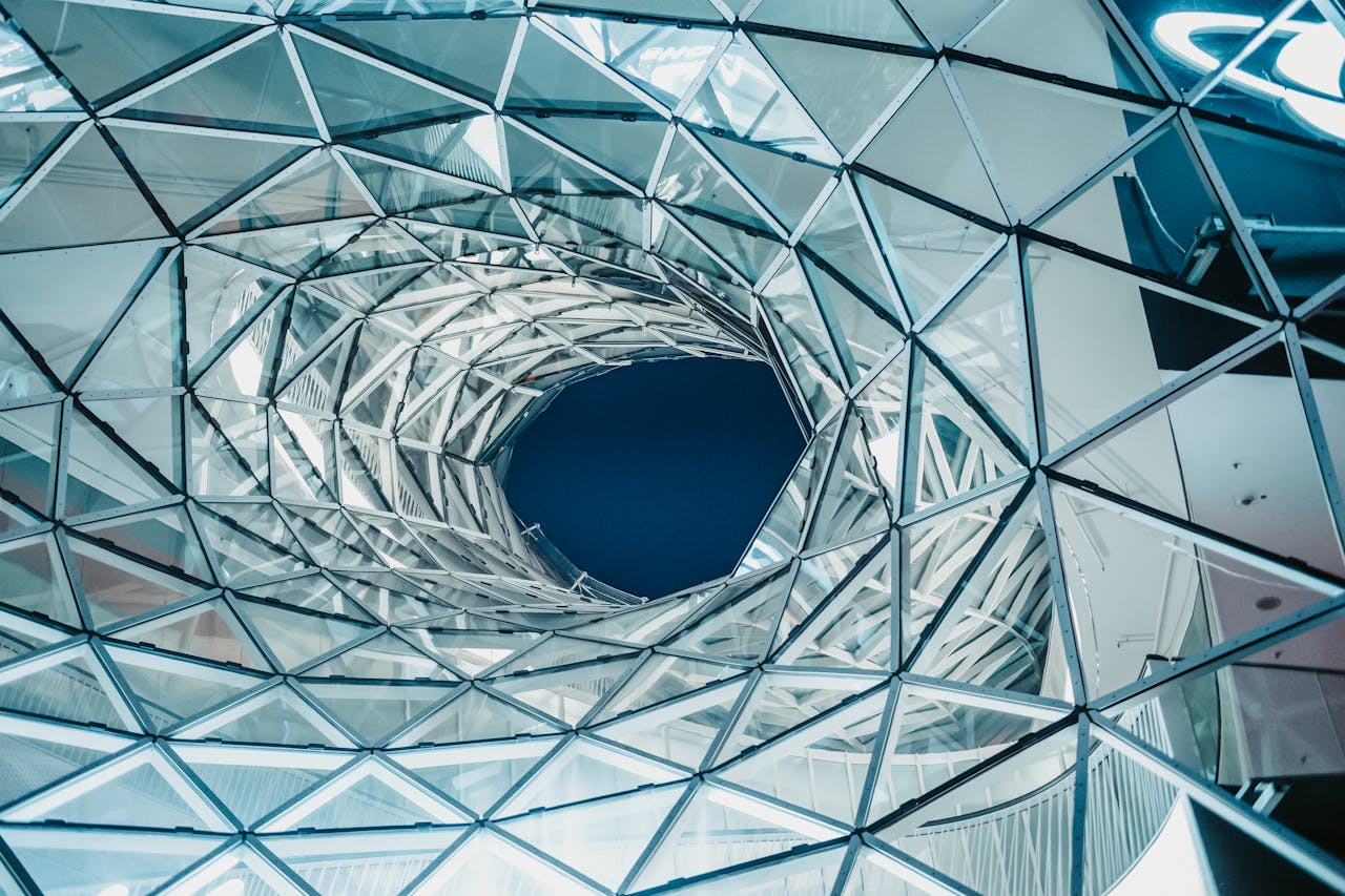 Dramatic view of MyZeil shopping mall's geometric ceiling, Frankfurt, Germany.